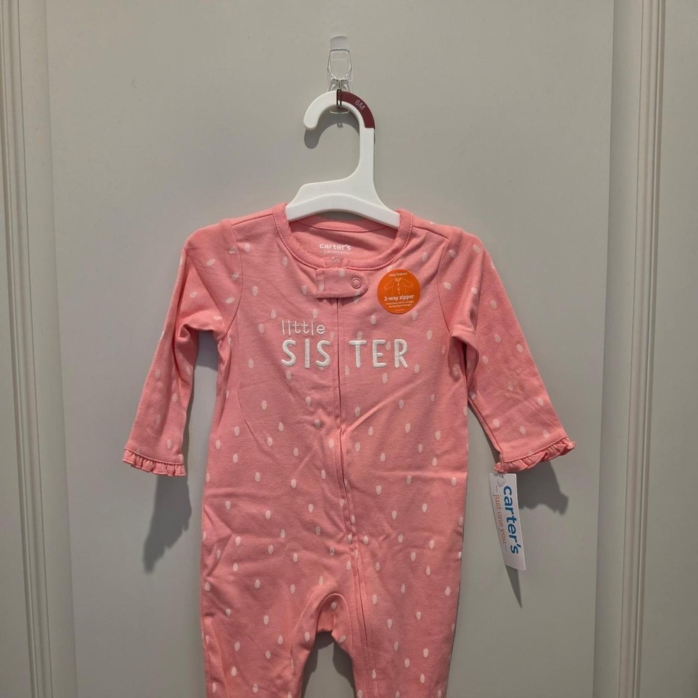 Carter's pink "Little Sister" onesie with white polka dots